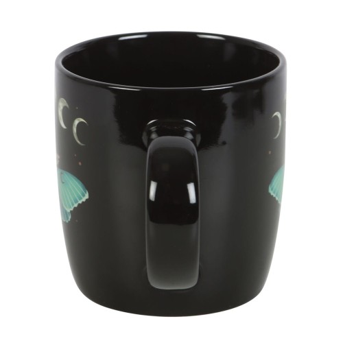 Czarny ceramiczny kubek z motywem ćmy księżycowej, faz Księżyca, gwiazd i kwiatów – kolekcja Dark Forest, pojemność 340 ml.