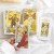 Golden Art Nouveau Tarot – talia 78 kart inspirowana Rider Waite Smith, zdobiona złotymi detalami. Elegancja secesji i magia intuicji w jednym.