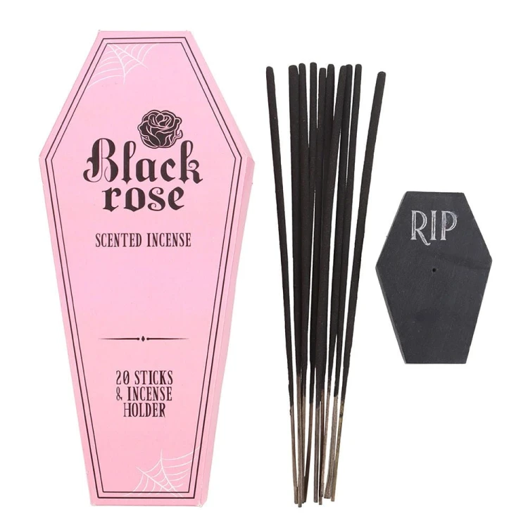Zestaw kadzidełek Black Rose z czarną podstawką w kształcie trumny z napisem RIP oraz różowym opakowaniem o gotyckim stylu.