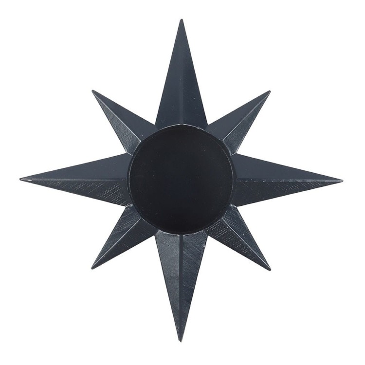 Widok z góry na świecznik Navy Star w kształcie gwiazdy – geometryczny symbol ochrony i światła.