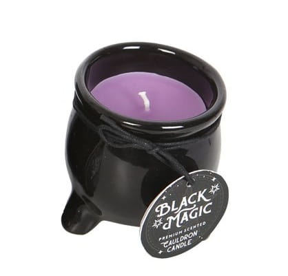 Fioletowa świeca rytualna Black Magic Prosperity w czarnym ceramicznym kociołku.