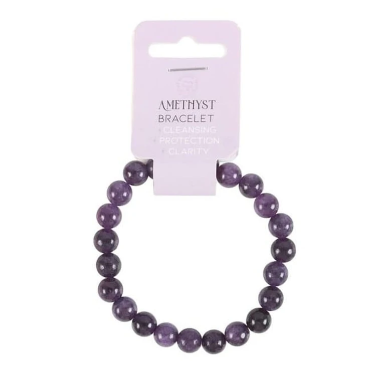 Bransoletka z naturalnego ametystu – „Kamień Spokoju”. Wspiera oczyszczanie, ochronę i jasność umysłu. Polerowane fioletowe koraliki na elastycznej żyłce, idealne do medytacji, jogi i codziennego noszenia.