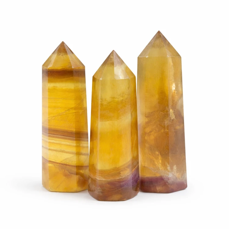 Naturalny kamień miodowy obelisk 6,6 – 7,5 cm w złotych odcieniach – kamień energii i pewności siebie.